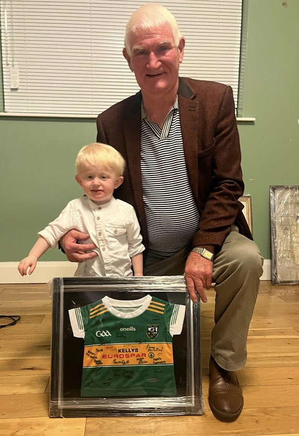 John j and Grandson with junior signed jersey framed