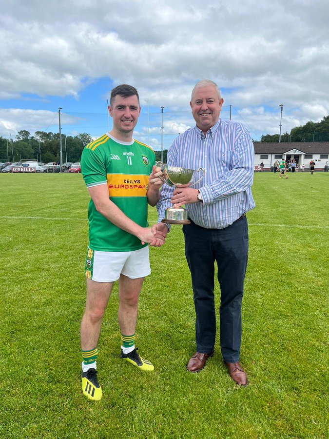 Danny Tallon being presented with the League Cup