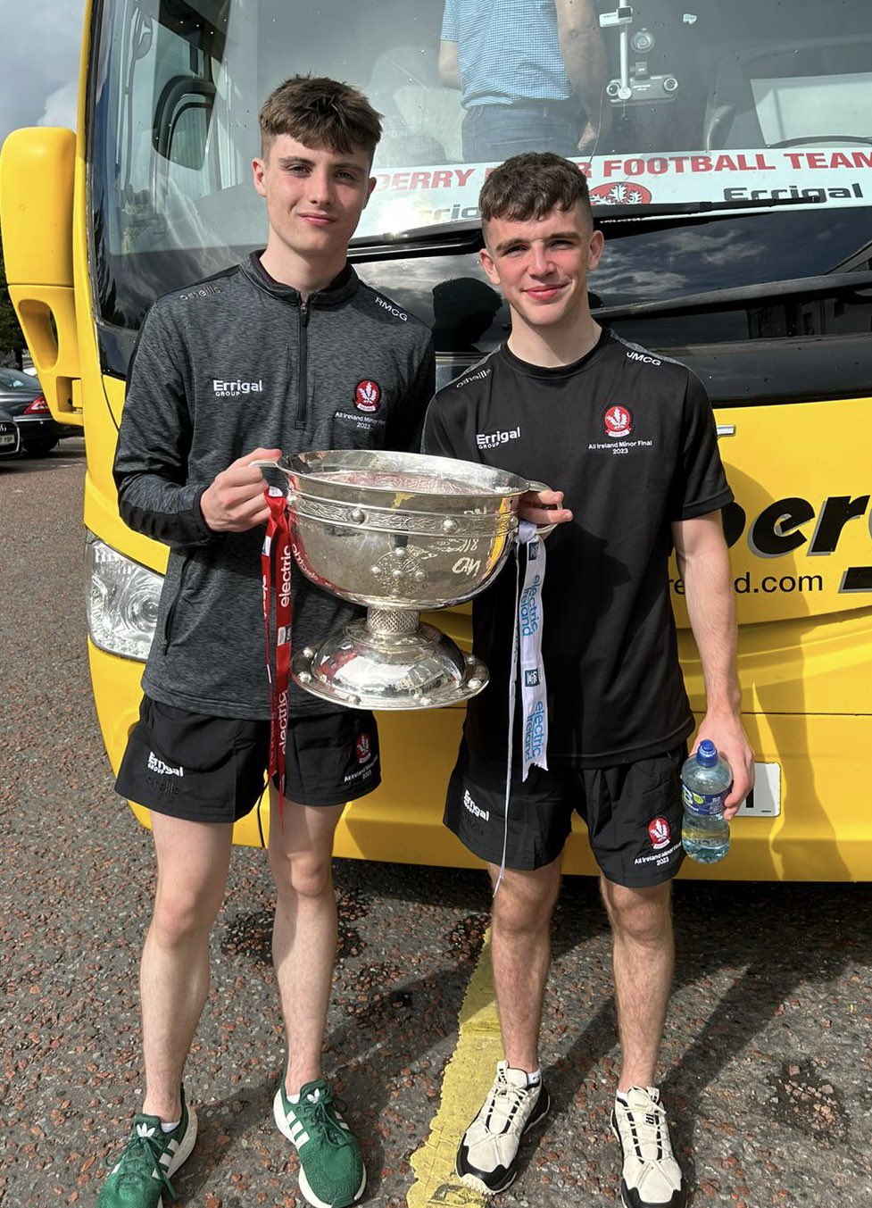 Rory McGonigle and Johnny McGuckin holding the cup